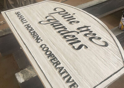 Kavips Coop Gardens sign after painting
