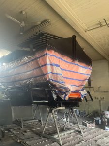 Kavips Sandblasting boat in shop