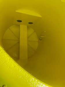 Kavips concrete silo after painting yellow